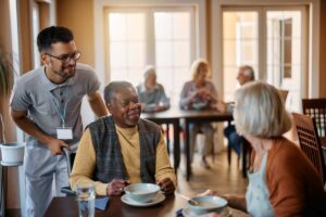 caregiver helping out a resident