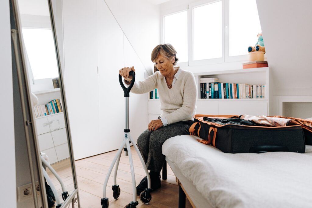 When a Parent Doesn't Want to Move senior woman suitcase